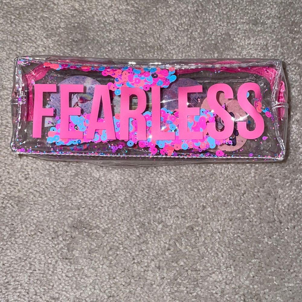 Fearless pouch with 4 unopened bath bombs inside